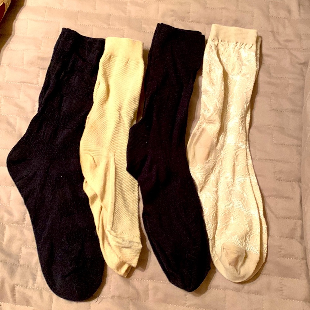 Four pairs of women’s patterned low dress socks in ivory and black Silky soft